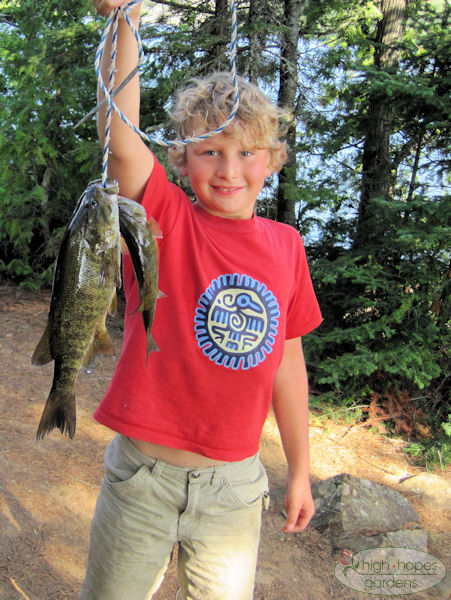 boy with smallmouth bass